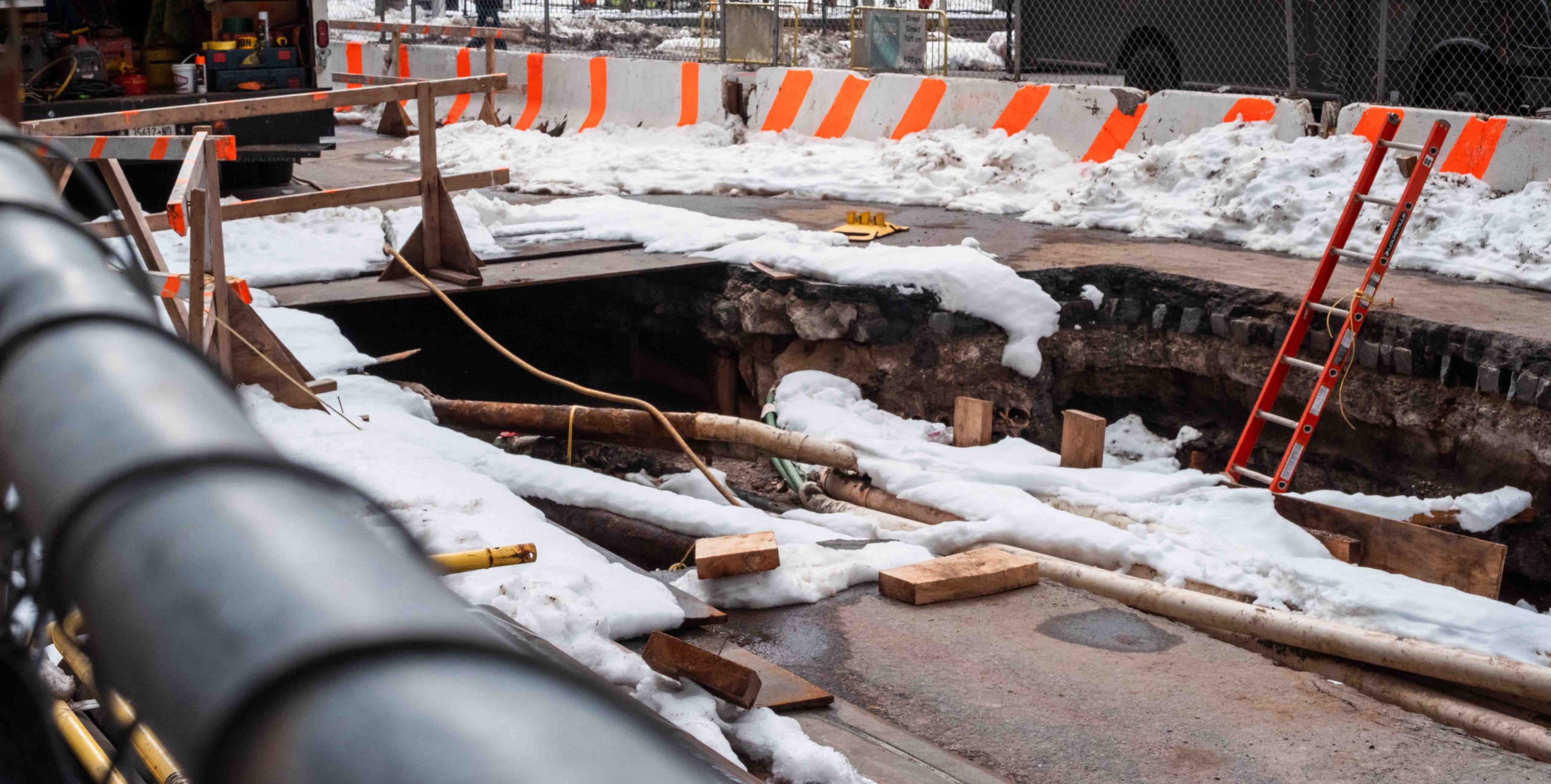 a construction site with snow and ice